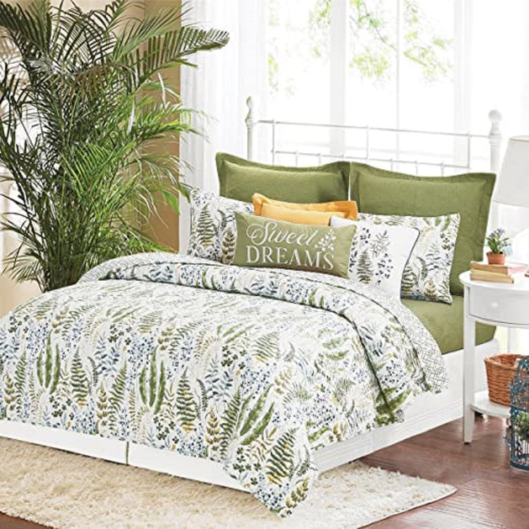 Quilt  with Leafy Flora Design with a Coordinating Trellis Print on the Reverse