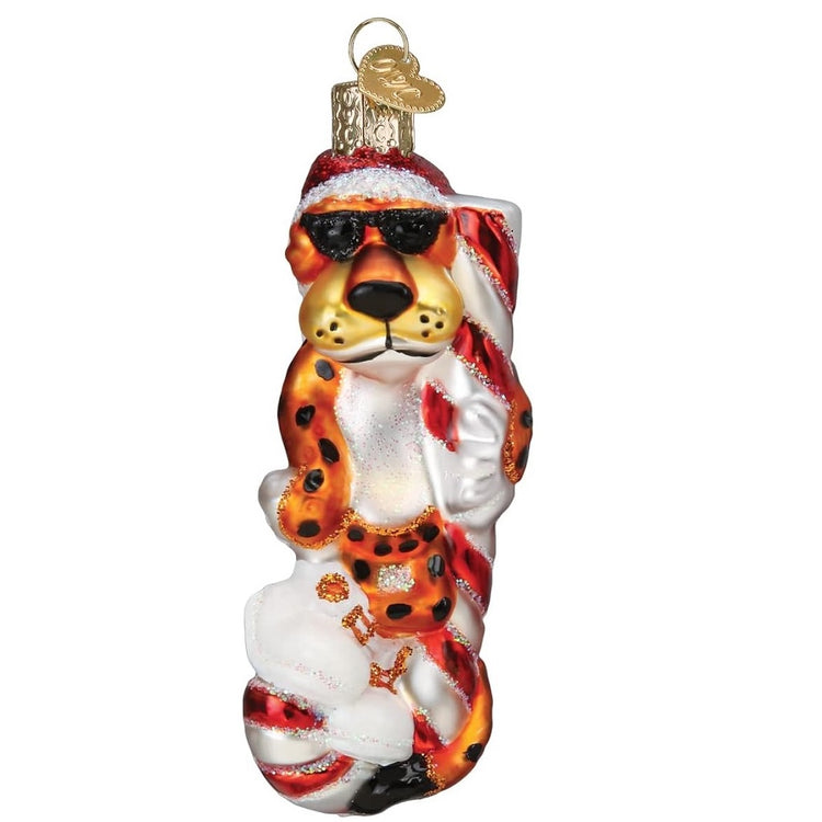 Blown glass ornament, Chester Cheetah, from the Cheetos brand, standing on an upside down candy cane.