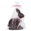 faux chocolate easter bunny figurine with pink bow in clear packaging brown resin decor