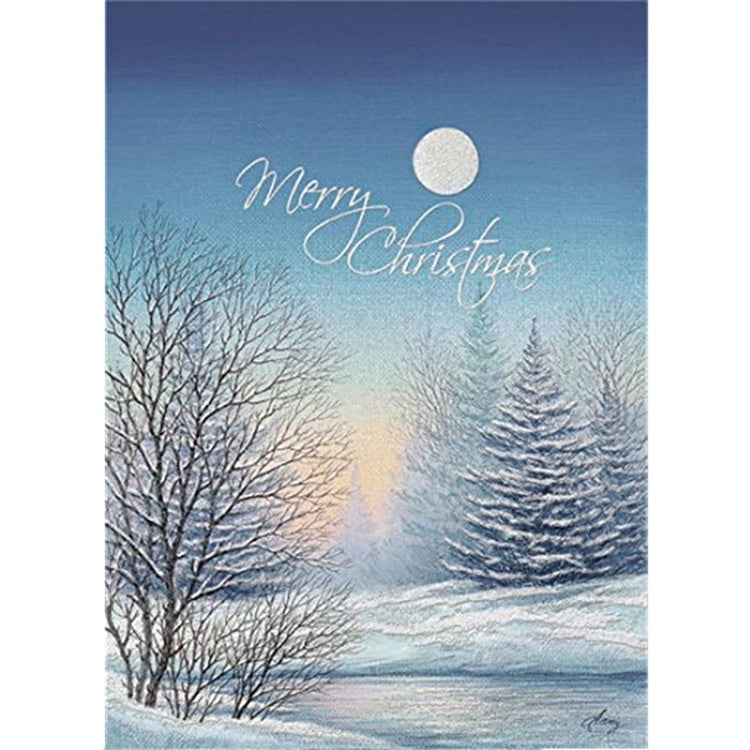 card in blue with a snowy scene in the woods, snow on the ground and on the trees, full moon. Merry Christmas