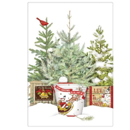 White towel with 3 evergreen trees growing. 2 are planted in wood crates and one in a white pail. Red cardinal in one tree.