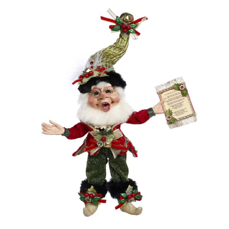 bearded elf wearing red jacket, green glittery pants and a light green stocking cap, he's holding a fancy paper with the words to a christmas caroling song.