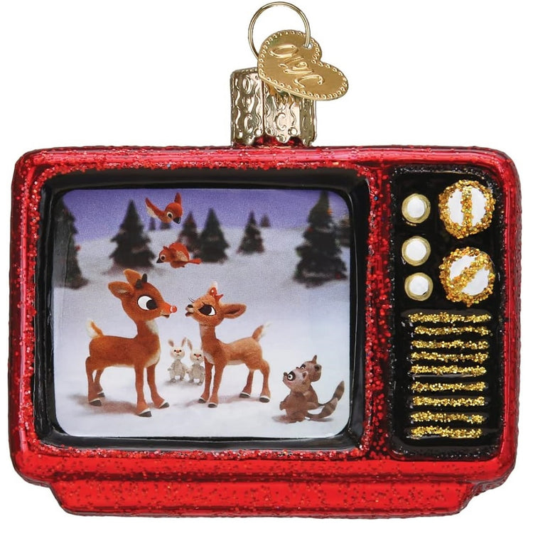 Blown glass ornament, vintage red box tv, with a scene from the classic Rudolph the Red Nosed Reindeer.