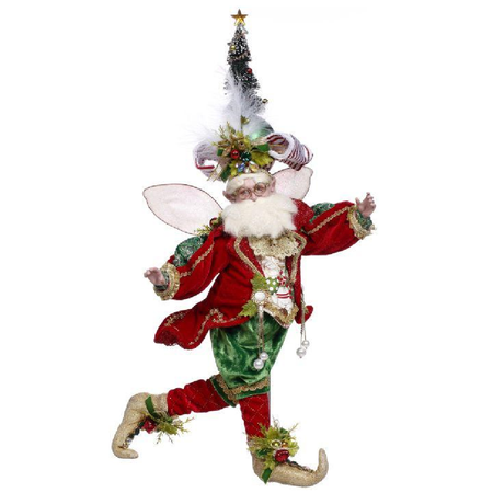 Decorative fairy figure with a Christmas tree on a white background