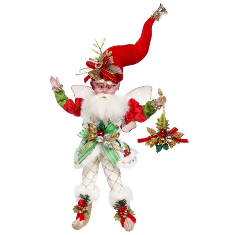 Bearded fairy figurine wearing white and red outfit, stocking cap and holding some holly swag.