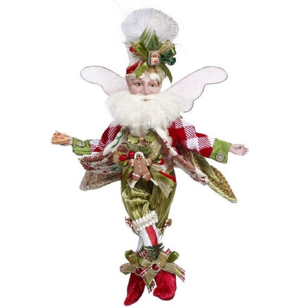 bearded fairy in green outfit with red and white checked jacket, adorned with ribbons and cookies.