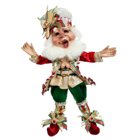 Bearded elf figurine wearing chef hat, and plaid outfit with cookie embellishments.