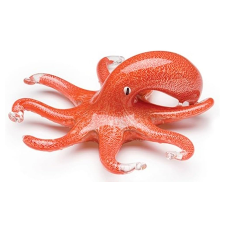 Blown glass coral orange octopus figurine on a white background