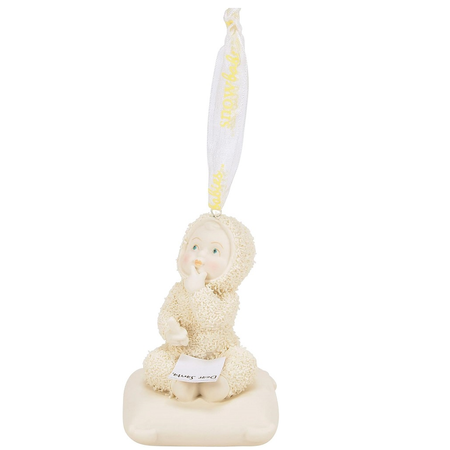 Snowbaby ornament, sitting with a note that says "Dear Santa"