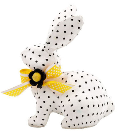 December Diamonds 5.5-inch white fabric bunny figurine with black polka dots standing on a flat surface, decorative home accent for spring or Easter