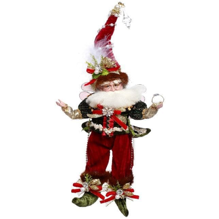Decorative fairy figurine with a tall hat and red outfit on a white background