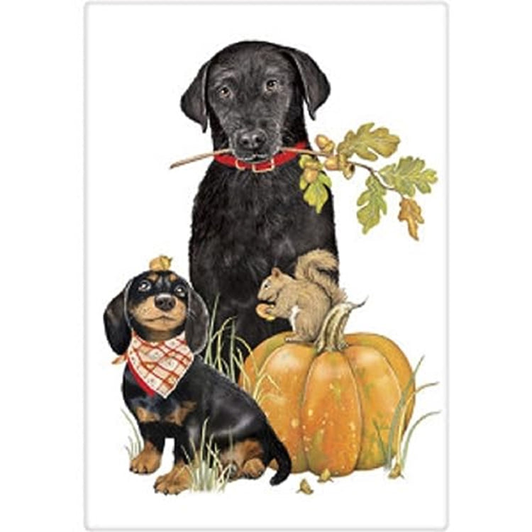 White kitchen towel with a black lab, a doxy , a squirrel and a pumpkin