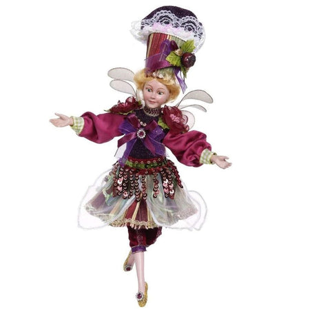 girl fairy in dress with bead and sequin accents, all shades of purple, her hat looks like a sugar plum cupcake