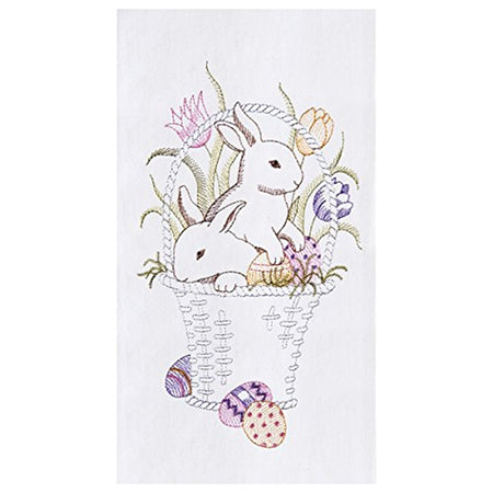 White towel with embroidered white basket with 2 bunnies and tulips and eggs
