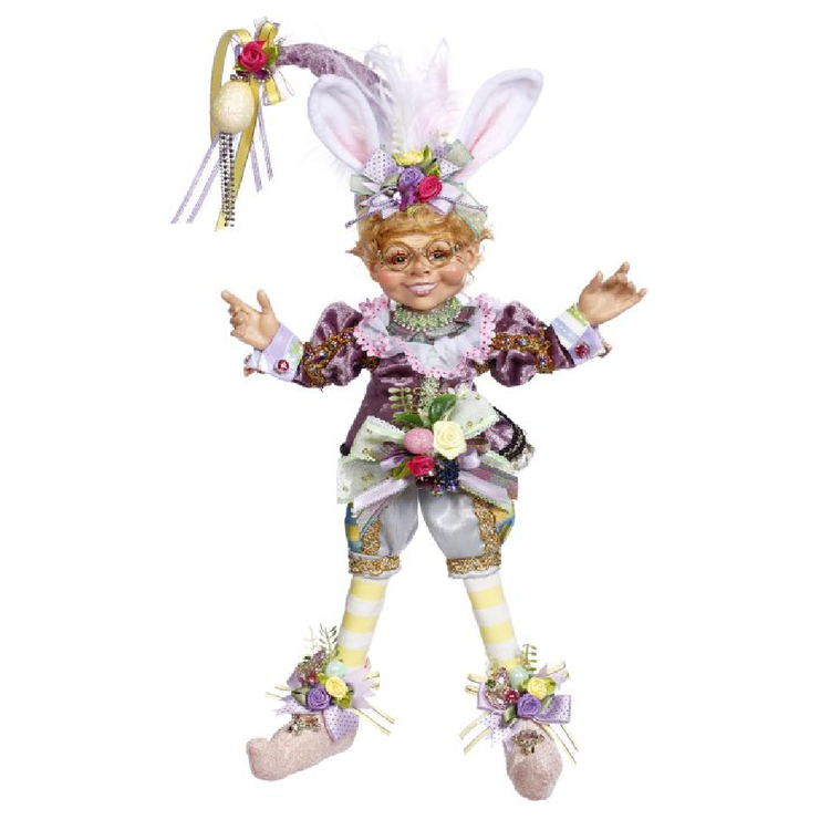 elfin wearing easter bunny ears and yellow striped tights