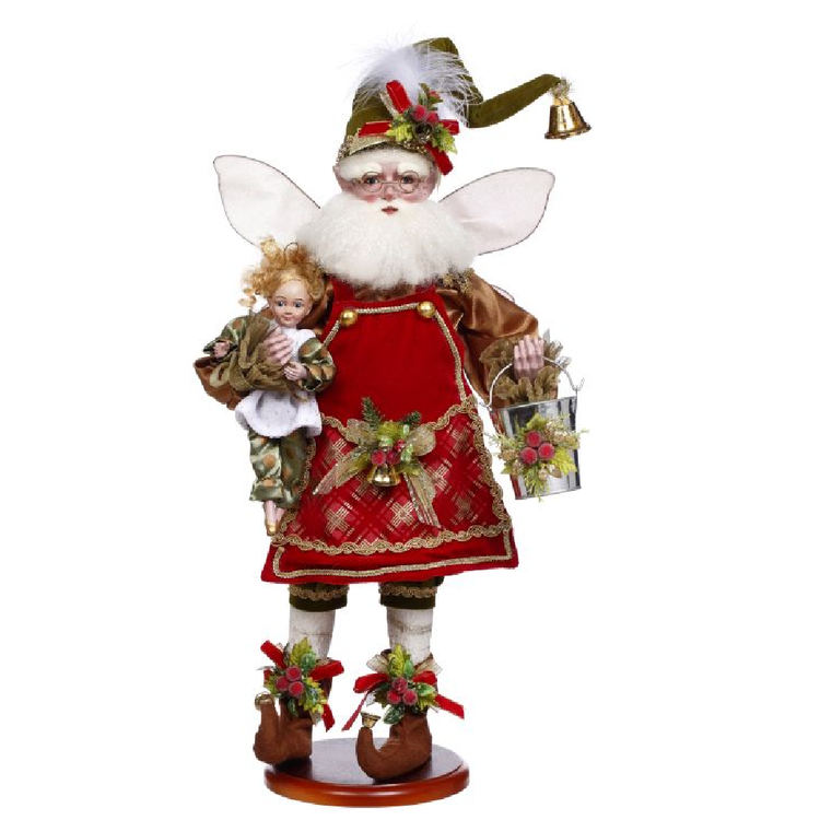 bearded fairy figurine holding a milk pail and a doll, on a stand.