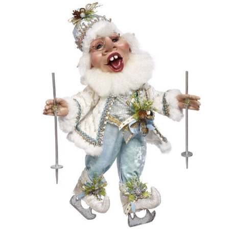 Decorative figure of an elf with a white and blue outfit, and holding ski poles on a white background