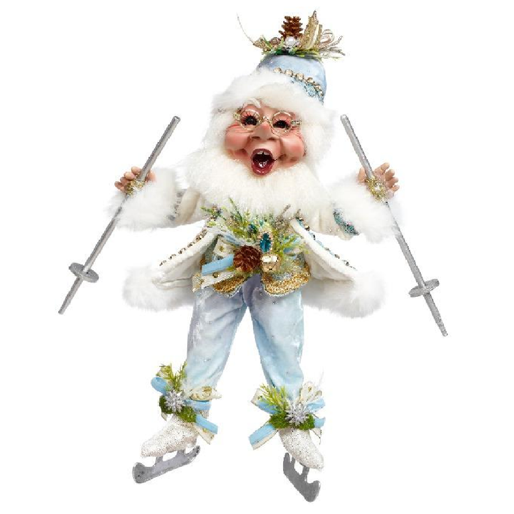 Decorative figure of a Santa Claus-like character in winter attire with skis on a white background