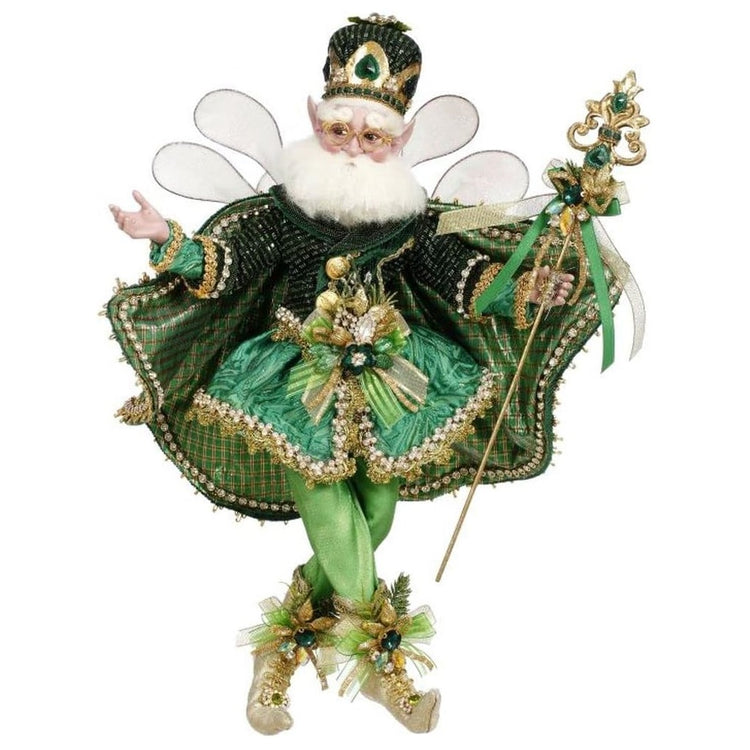 Bearded fairy in all green outfit, and cape with gold accenets. Holding a gold and green sceptre.