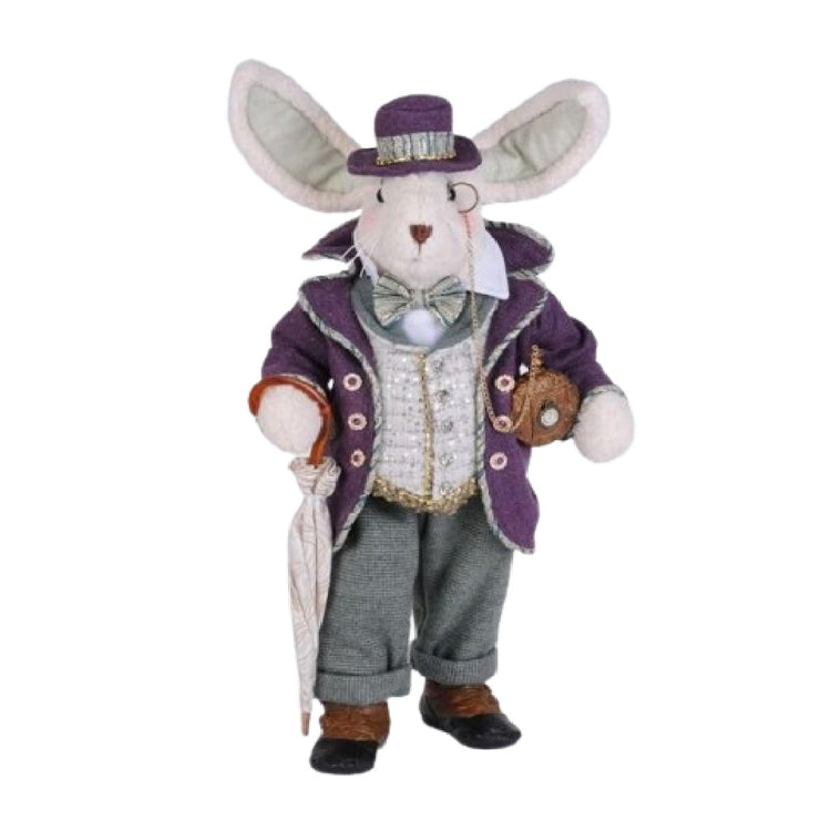 fabric bunny figurine wearing purple jacket and hat, with a pocket watch and an umbrella.