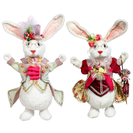 Two furry rabbit figurines in pink and red coats, one with a top hat, one with a bow and umbrella.