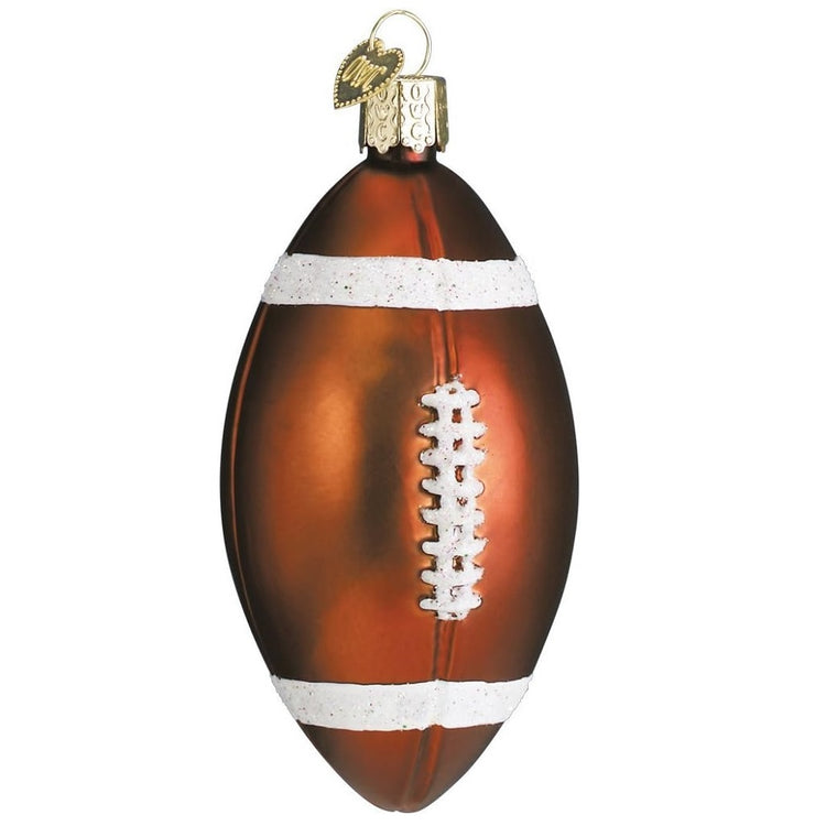 Blown glass football ornament with glitter accents.