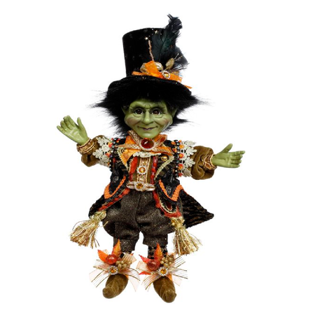 Green Frankenstein Themed elf figurine wearing orange and black suit and top hat.