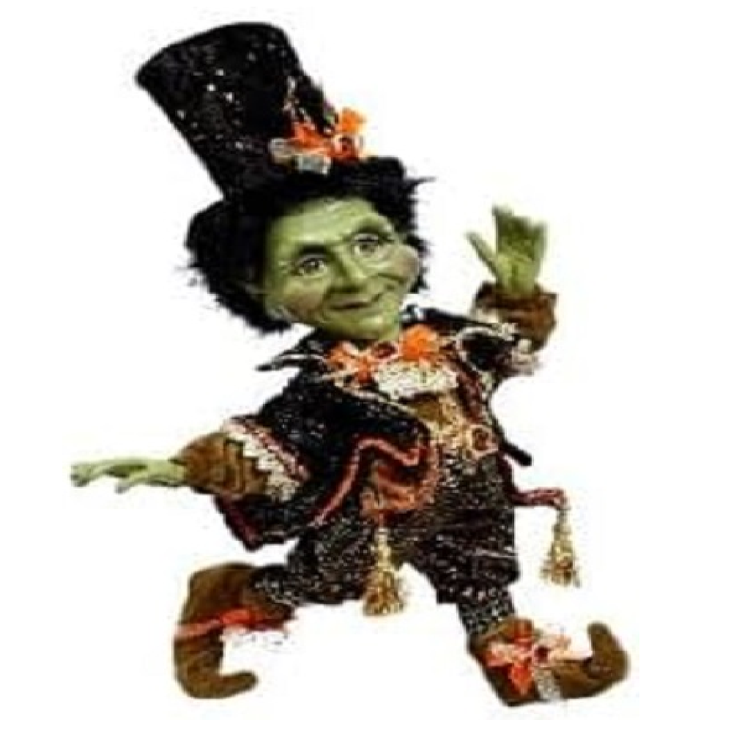 Green Frankenstein inspired elf figurine with a top hat on a white background