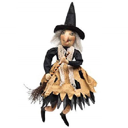 Grey haired witch with an orange & black broom.