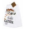Folded white kitchen towel with White Truck with Pumpkins and the wording "thankful to GATHER"