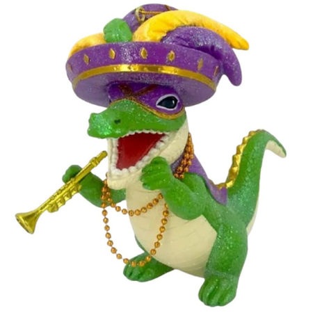 resin alligator ornament on his back legs, wearing purple yellow and green mardi gras hat, mask and beads. Holding a trumpet.
