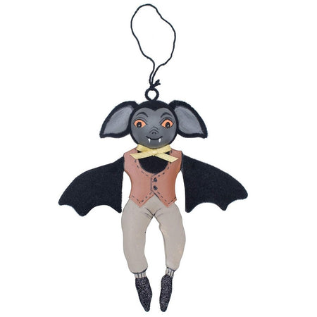 tin and plastic bat ornament. he's wearing a orange vest and yellow bow tie.