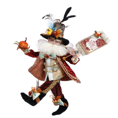 Bearded fairy wearing red velvet coat, a top hat with ribbon and feathers. He's holding a pumpkin in one hand and a sign that says "give thanks" in the other.