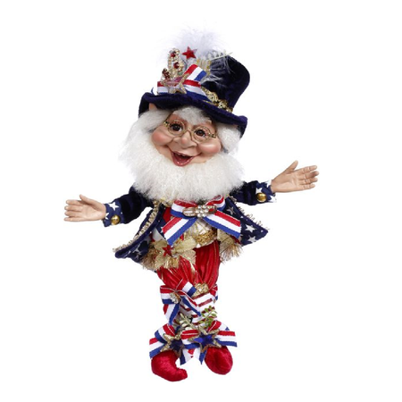 Bearded elf in red white and blue outfit, including star patterned jacket. Top hat with ribbon and star accents.