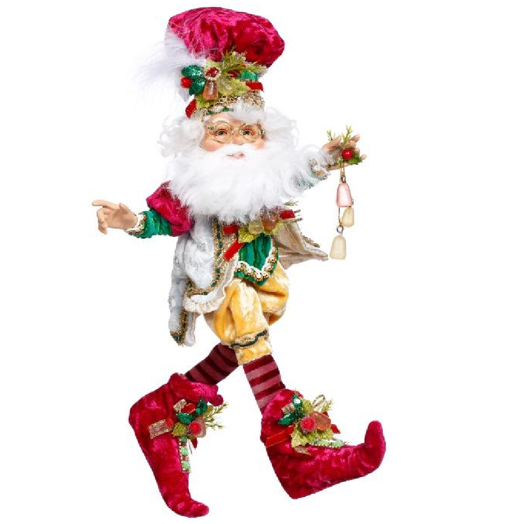 bearded elf wearing gold and red outfit with gum drop accents.