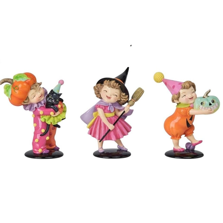 December Diamonds assorted Halloween kids figurines with pumpkin, witch and teal pumpkin designs