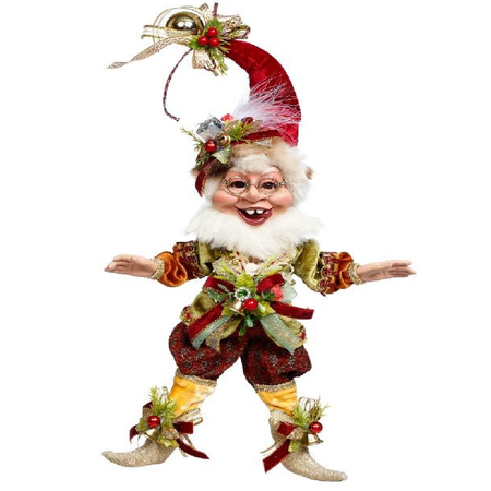 Decorative Christmas elf figurine with a red hat and festive outfit on a white background.