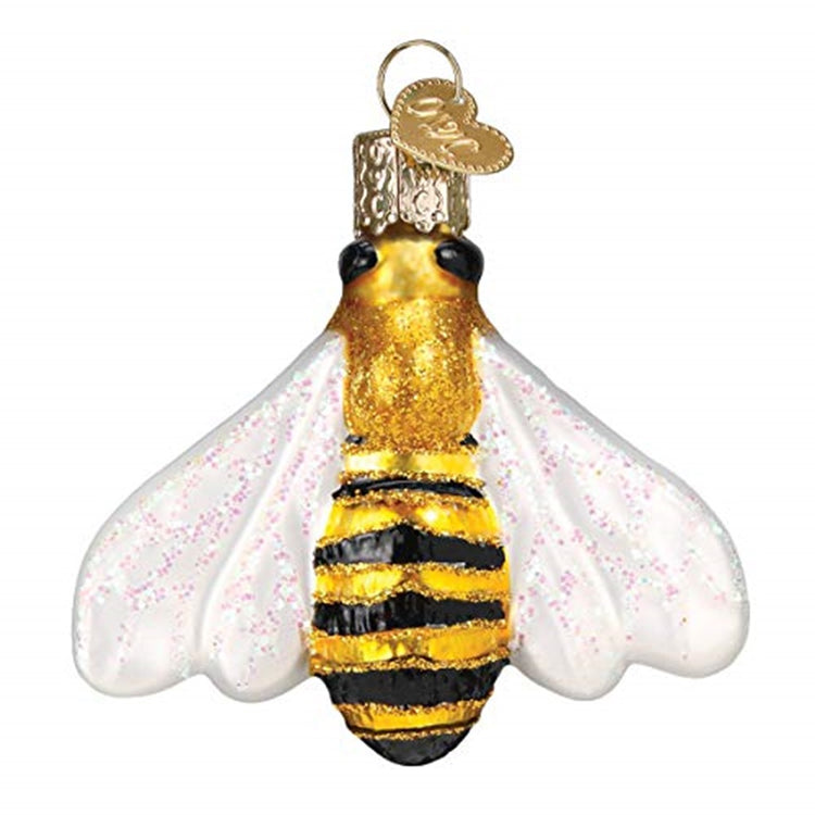 Honey Bee shaped ornament with gold color body and black stripes.  White wings.