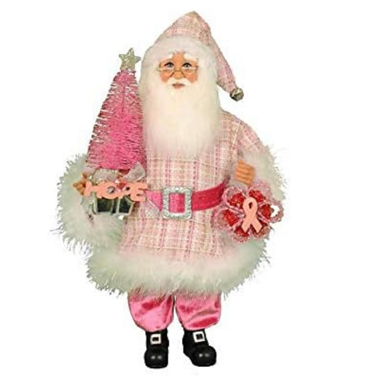 Santa figurine dressing in pink suit, holding a pink bottle brush tree that says "hope" and  an ornament in the other hand with a breast cancer awareness ribbon.