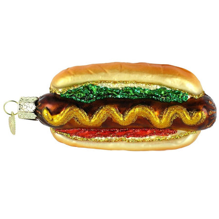 blown glass orament depicting a hot dog in a bun with ketchup, mustard and relish.