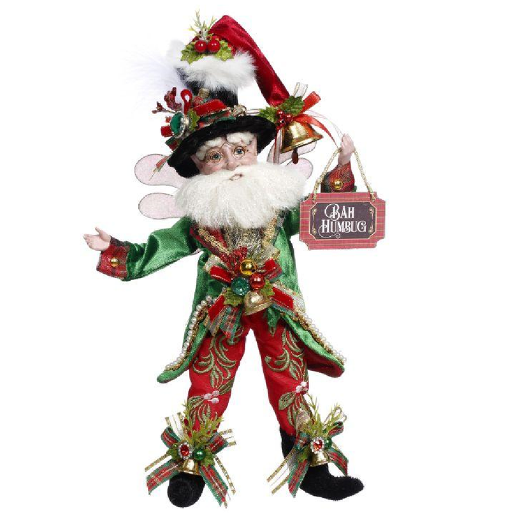 Decorative Christmas figure of an elf with a 'Bah Humbug' sign on a white background
