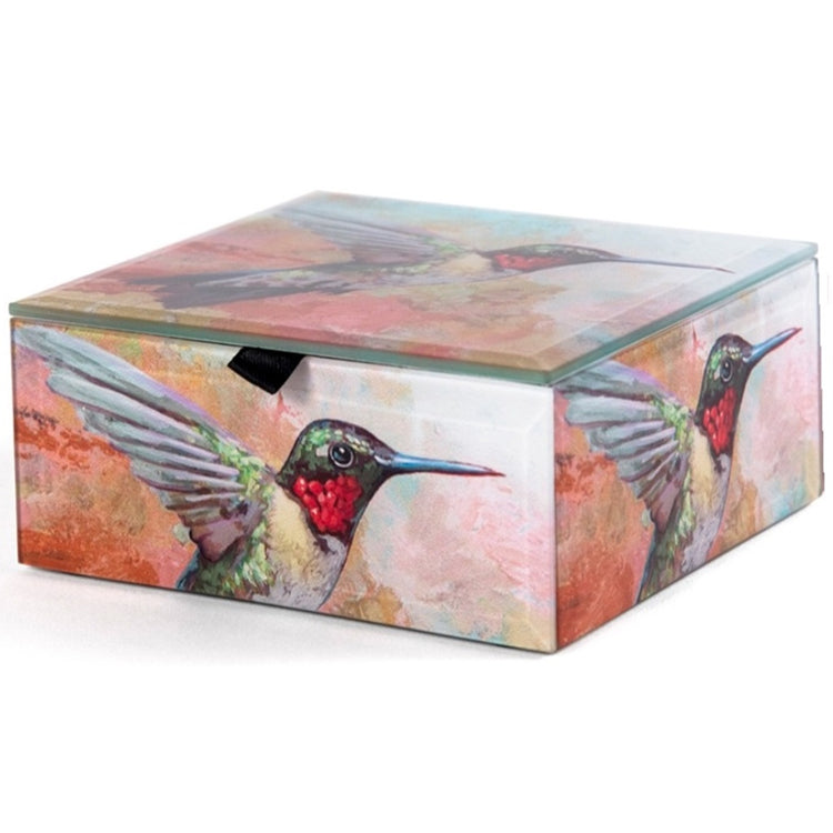 Square box with hummingbird design on all sides and top.