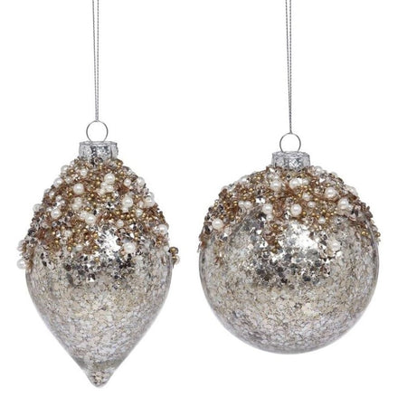 two blown glass hanging ornaments, one ball, one onion shape, gold glitter with pearl accents.