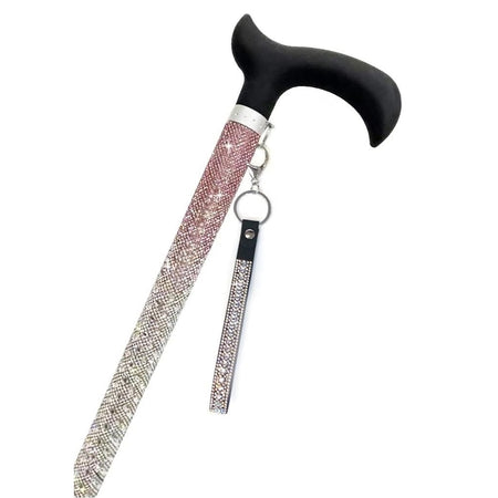 walking cane with black handle, bedazzled with rhinestones in pink to silver ombre design