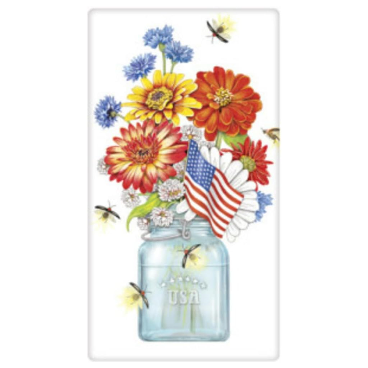 white flour sack towel with image of a glass jar full of red and blue flowers, an american flag and Fireflies flying around.