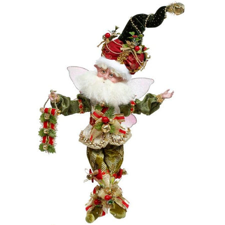 fairy wiht tall green hat, red trim. Lots of bells and bows. Green and gold outfit,  holds a ribbon of 3 bells