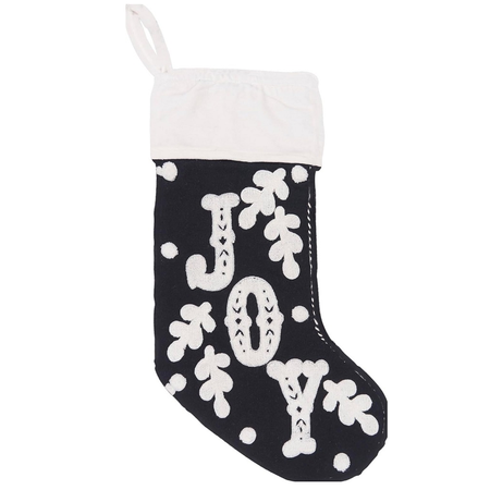 Black and white stocking with the word "joy" on it.