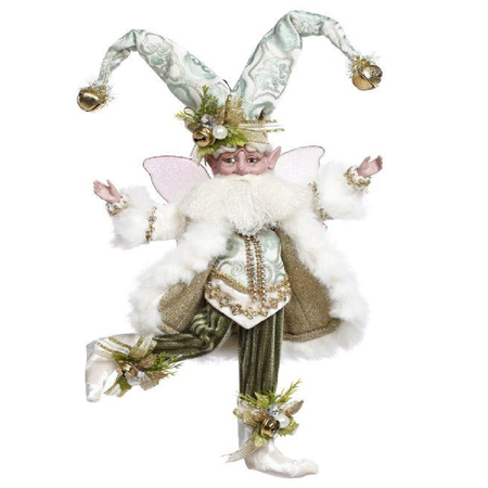 Decorative fairy figure with a white hat and fluffy white coat on a white background