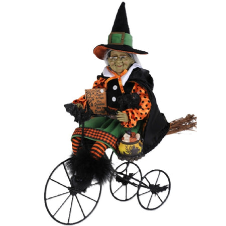 Karen Didion Margaret's Biking Venture 18-inch Halloween witch figurine riding a vintage-style tricycle with a black cat, pumpkin cauldron, and Trick or Treat sign.