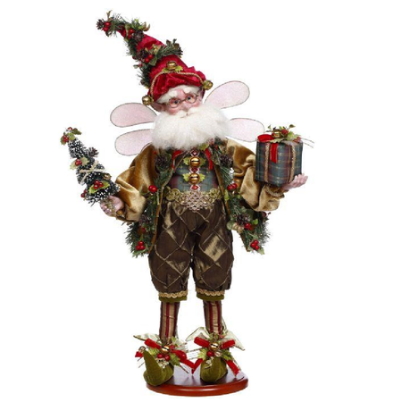 Decorative fairy figurine with Christmas-themed attire on a white background